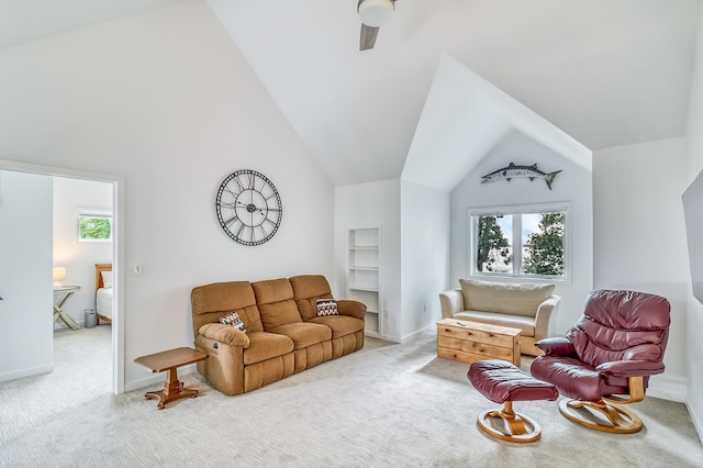 26533 Paradise Point Rd, Detroit Lakes, MN 56501 - living room with carpet floors, plenty of natural light, lofted ceiling, a ceiling fan, and built in shelves