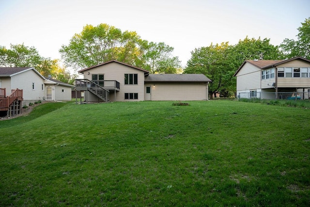 408 19th St NW, Willmar, MN 56201 - back of property with stairway and a wooden deck