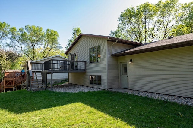 408 19th St NW, Willmar, MN 56201 - rear view of property with stairs, a deck, and a yard