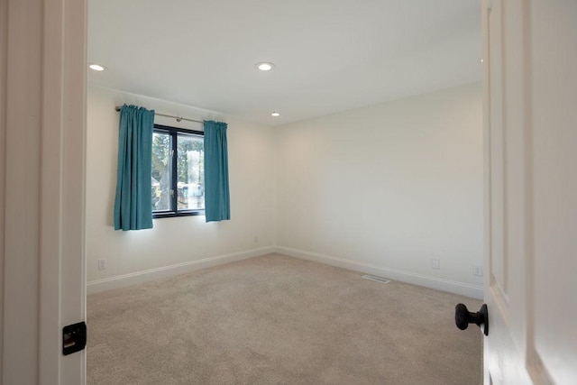 408 19th St NW, Willmar, MN 56201 - carpeted empty room with recessed lighting and baseboards