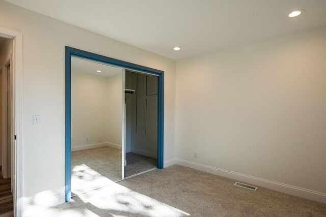 408 19th St NW, Willmar, MN 56201 - unfurnished bedroom featuring carpet flooring, recessed lighting, a closet, and baseboards