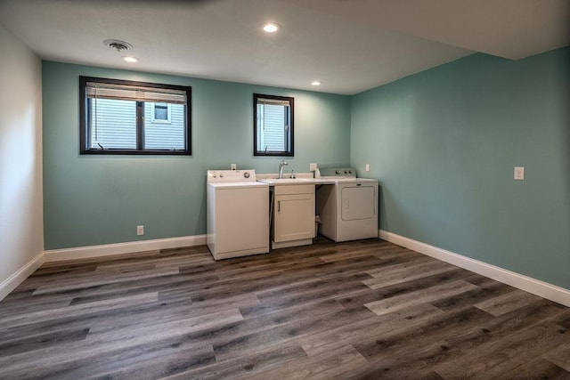 408 19th St NW, Willmar, MN 56201 - laundry room with washing machine and dryer, cabinet space, baseboards, dark wood finished floors, and recessed lighting