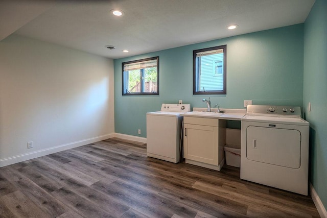 408 19th St NW, Willmar, MN 56201 - laundry room with cabinet space, washing machine and dryer, dark wood-type flooring, recessed lighting, and baseboards