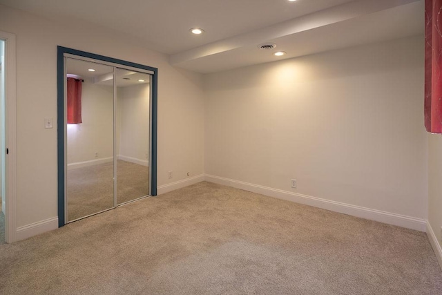 408 19th St NW, Willmar, MN 56201 - unfurnished bedroom featuring carpet flooring, recessed lighting, baseboards, and a closet