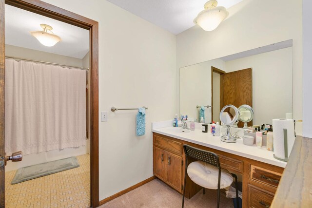 11110 Utica Ave S, Bloomington, MN 55437 - full bathroom featuring vanity, shower / bath combo with shower curtain, and baseboards