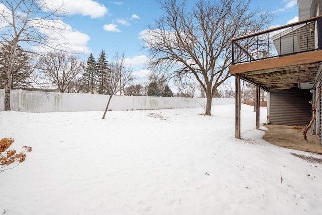 11110 Utica Ave S, Bloomington, MN 55437 - yard covered in snow with a deck