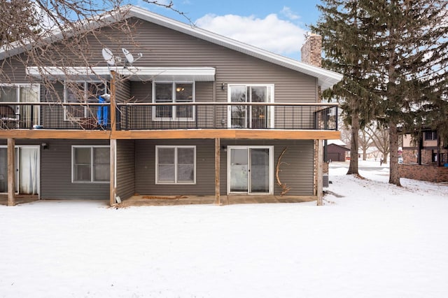 11110 Utica Ave S, Bloomington, MN 55437 - snow covered rear of property with a chimney