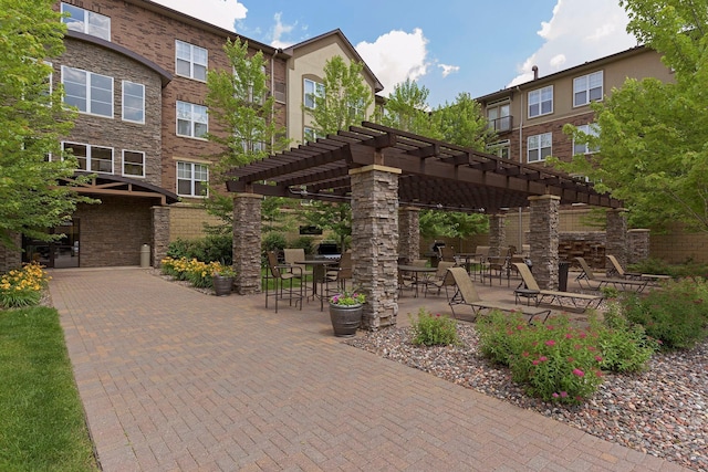 13560 Technology Dr Unit 1325, Eden Prairie, MN 55344 - view of community with a pergola and a patio