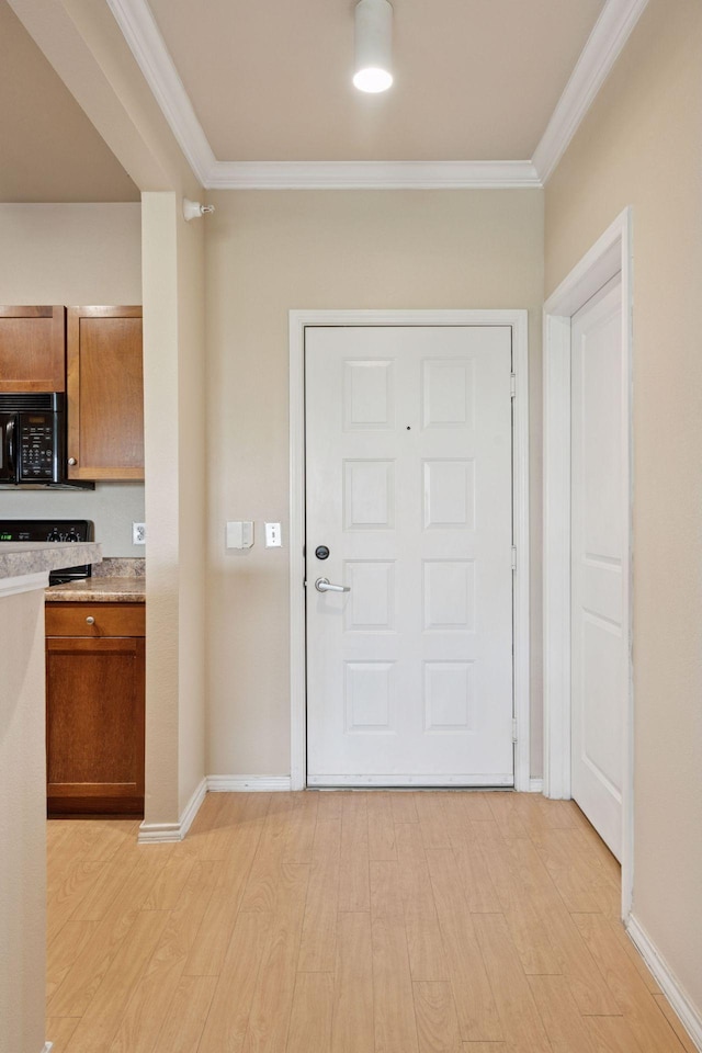 13560 Technology Dr Unit 1325, Eden Prairie, MN 55344 - foyer entrance with ornamental molding, light wood-style flooring, and baseboards