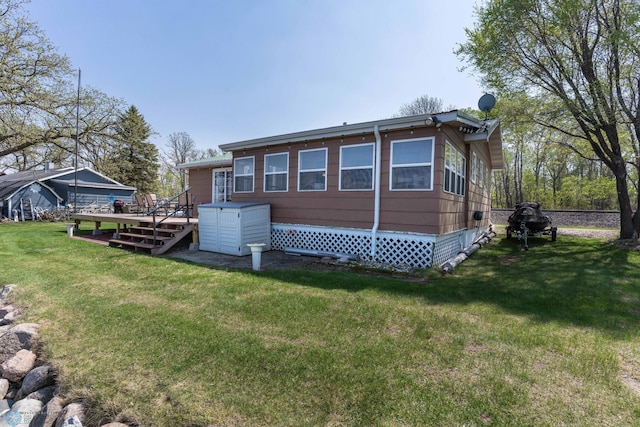 38603 Cozy Cove Rd, Dead Lake Twp, MN 56528 - back of house featuring a wooden deck and a yard