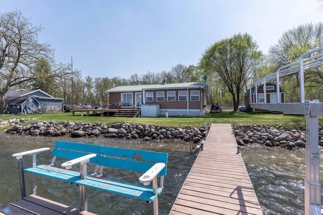 38603 Cozy Cove Rd, Dead Lake Twp, MN 56528 - dock featuring a lawn, boat lift, and a deck with water view
