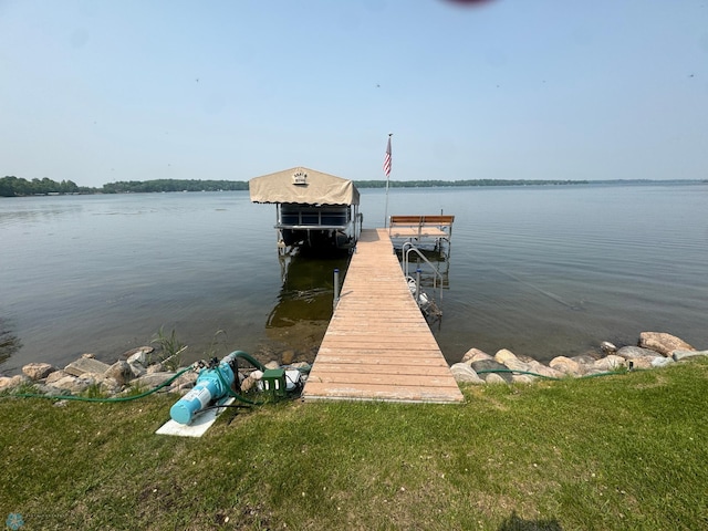 38603 Cozy Cove Rd, Dead Lake Twp, MN 56528 - dock with boat lift and a water view