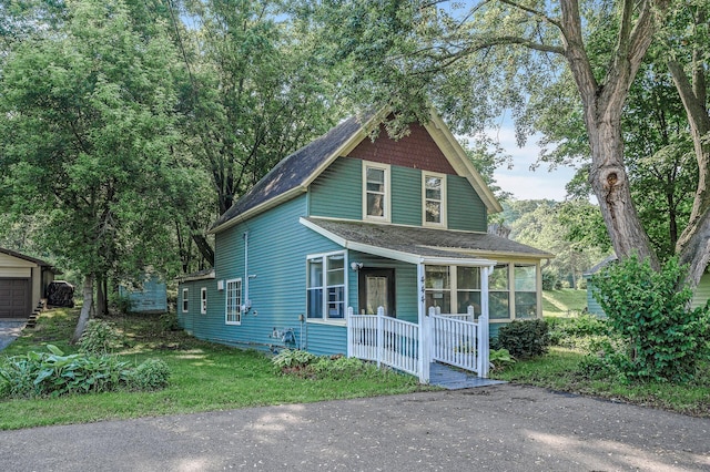 444 Vincent St, Saint Croix Falls, WI 54024 - view of front of home featuring a shingled roof and a porch