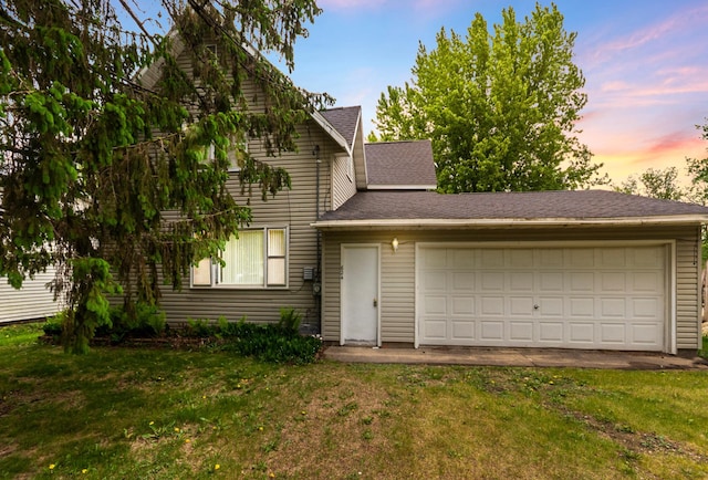 624 Main St, West Concord, MN 55985 - traditional-style home featuring a lawn and a shingled roof