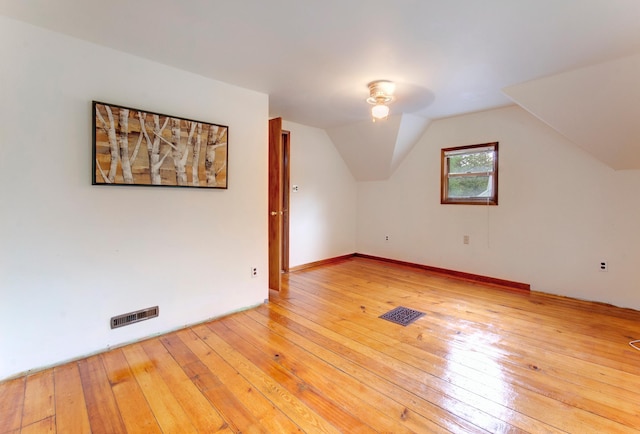 624 Main St, West Concord, MN 55985 - additional living space featuring light wood-type flooring and lofted ceiling
