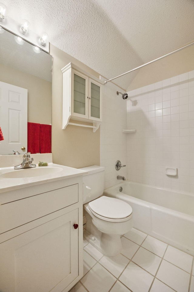 5510 Heather Dr SW, Rochester Twp, MN 55902 - full bathroom featuring toilet, washtub / shower combination, vanity, a textured ceiling, and lofted ceiling