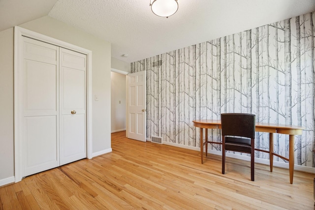 5510 Heather Dr SW, Rochester Twp, MN 55902 - home office featuring wood finished floors and baseboards
