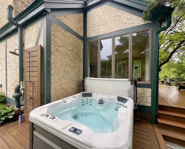 5510 Heather Dr SW, Rochester Twp, MN 55902 - wooden terrace featuring a hot tub