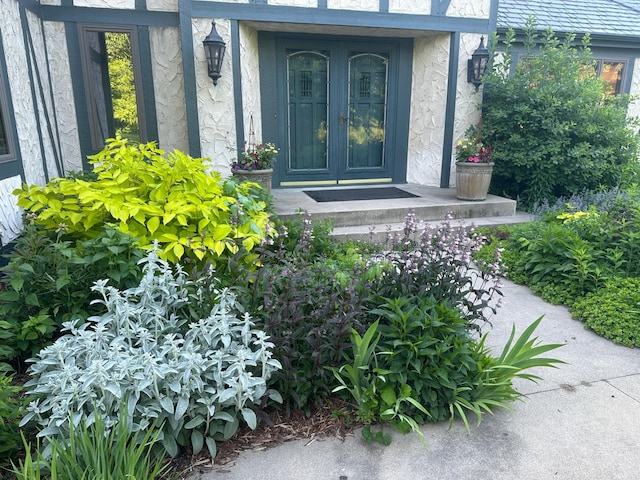 5510 Heather Dr SW, Rochester Twp, MN 55902 - doorway to property featuring french doors and stone siding