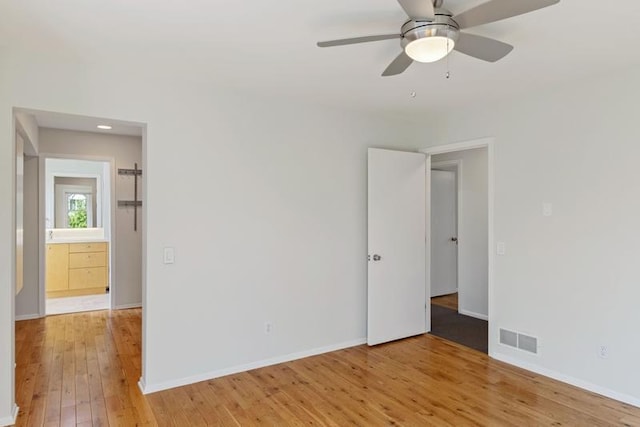 unfurnished room with light wood finished floors, ceiling fan, baseboards, and recessed lighting