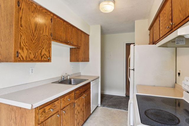 910 6th St S Unit 3, Hopkins, MN 55343 - kitchen featuring white appliances, a sink, under cabinet range hood, brown cabinetry, and light countertops
