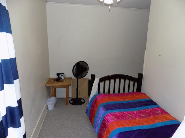 carpeted bedroom with crown molding