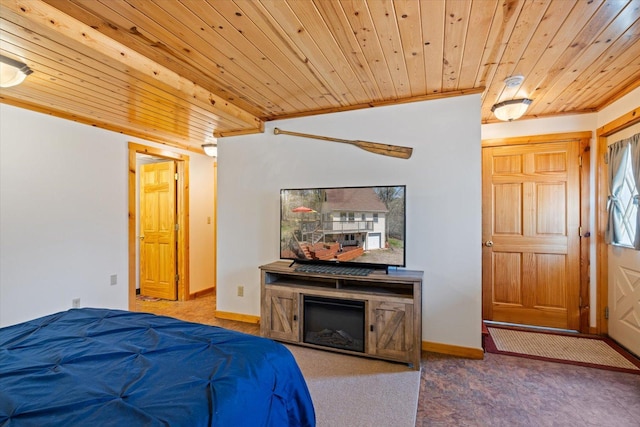 25185 Moreau Rd, Aitkin, MN 56431 - bedroom with wood ceiling, carpet floors, and baseboards