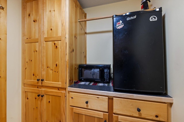 25185 Moreau Rd, Aitkin, MN 56431 - kitchen with black appliances