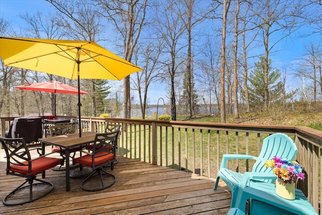 25185 Moreau Rd, Aitkin, MN 56431 - deck featuring outdoor dining area
