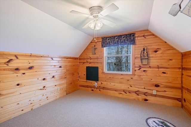 25185 Moreau Rd, Aitkin, MN 56431 - bonus room featuring wooden walls, lofted ceiling, carpet flooring, and a ceiling fan