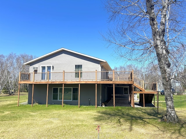55715 State Highway 11, Warroad, MN 56763 - rear view of house with a wooden deck, a yard, and stairway