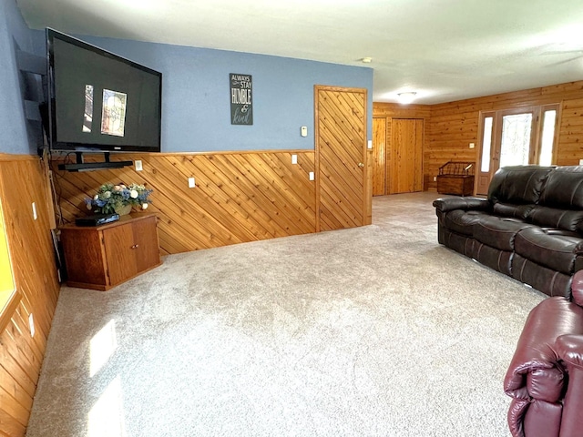 55715 State Highway 11, Warroad, MN 56763 - living area featuring wooden walls, carpet flooring, and wainscoting