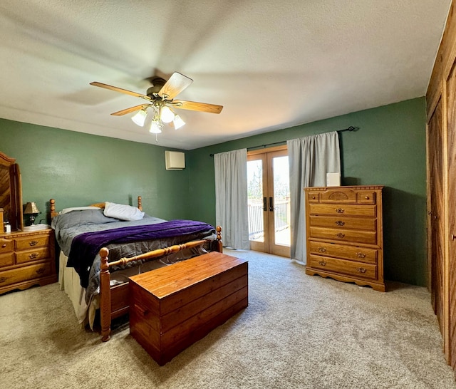 55715 State Highway 11, Warroad, MN 56763 - bedroom featuring french doors, access to outside, carpet floors, ceiling fan, and a textured ceiling