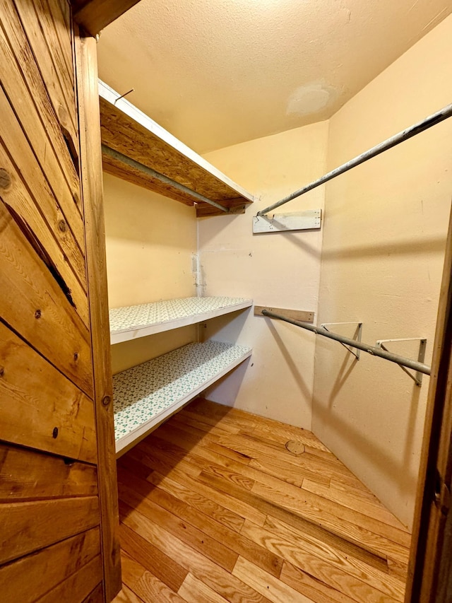 55715 State Highway 11, Warroad, MN 56763 - spacious closet featuring wood finished floors