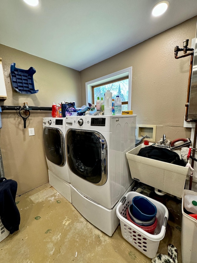 55715 State Highway 11, Warroad, MN 56763 - washroom featuring independent washer and dryer and a textured wall