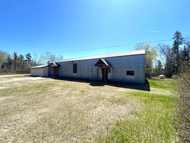 55715 State Highway 11, Warroad, MN 56763 - view of pole building with a yard