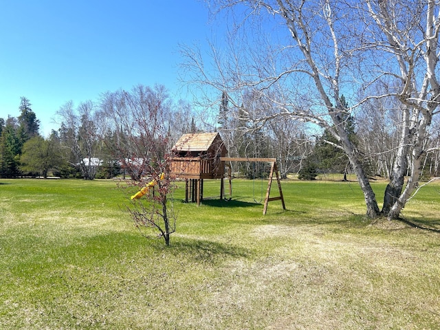 55715 State Highway 11, Warroad, MN 56763 - view of grassy yard featuring a playground