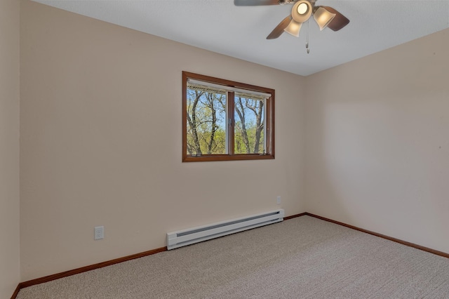empty room with a baseboard radiator, carpet flooring, ceiling fan, and baseboards