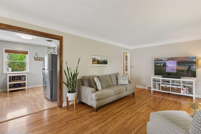 805 California Ave W, Saint Paul, MN 55117 - living area with wood finished floors and baseboards