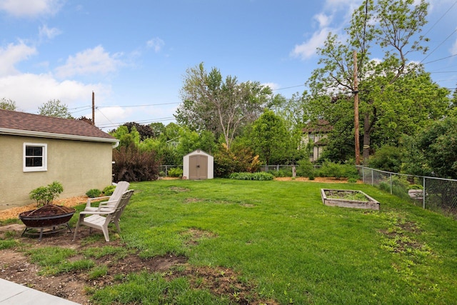 805 California Ave W, Saint Paul, MN 55117 - view of yard featuring an outdoor fire pit and a garden