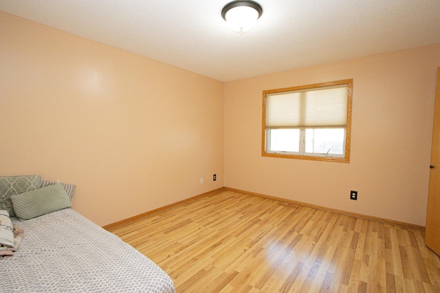 147 Waynesborough Way, Mankato, MN 56001 - unfurnished bedroom with light wood-type flooring and baseboards