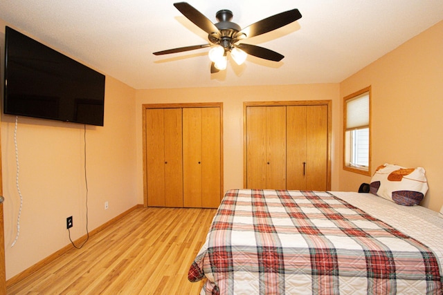 147 Waynesborough Way, Mankato, MN 56001 - bedroom featuring light wood-style floors, multiple closets, baseboards, and ceiling fan