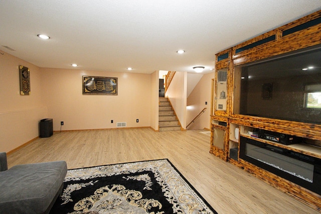 147 Waynesborough Way, Mankato, MN 56001 - living area featuring wood finished floors, stairs, recessed lighting, and baseboards