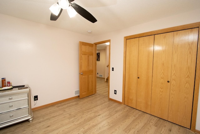 147 Waynesborough Way, Mankato, MN 56001 - unfurnished bedroom featuring light wood finished floors, a closet, baseboards, and a ceiling fan