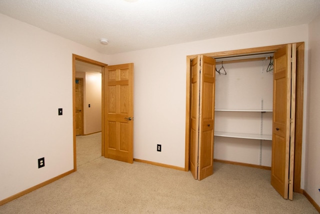 147 Waynesborough Way, Mankato, MN 56001 - unfurnished bedroom featuring light carpet, a closet, and baseboards