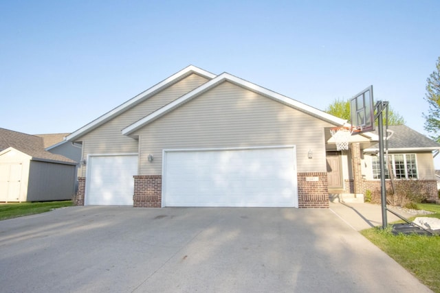 147 Waynesborough Way, Mankato, MN 56001 - view of front of house with brick siding, an attached garage, and concrete driveway