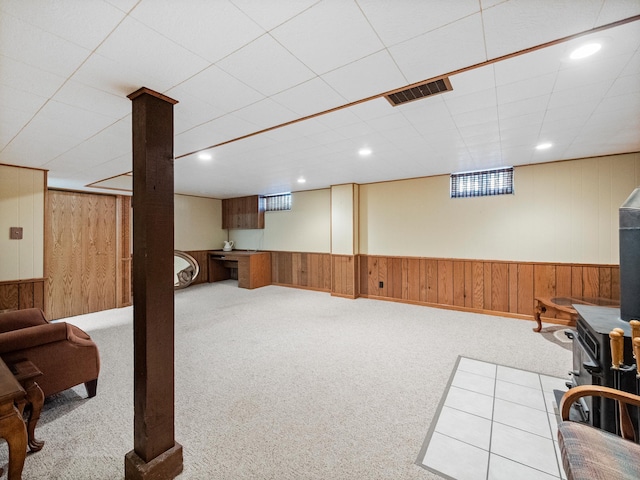 116 California Ave, Morris, MN 56267 - finished below grade area featuring wood walls, carpet, a wainscoted wall, and recessed lighting