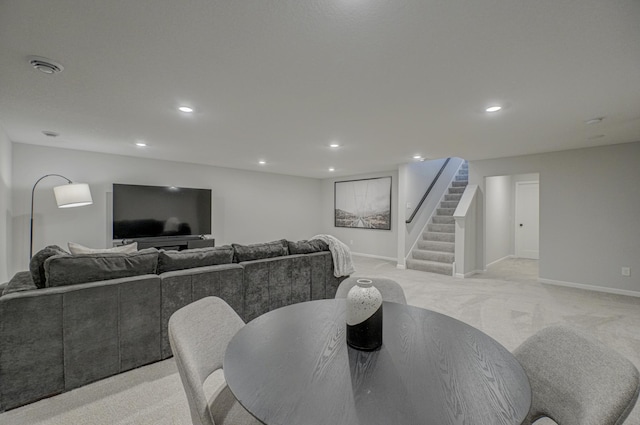 dining room featuring light carpet, stairs, recessed lighting, and baseboards