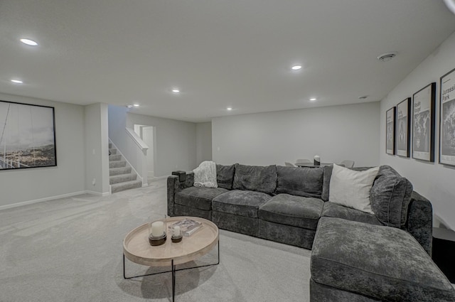 living room with stairway, recessed lighting, carpet, and baseboards