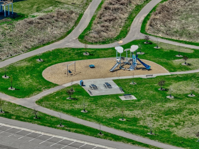 view of home's community with uncovered parking